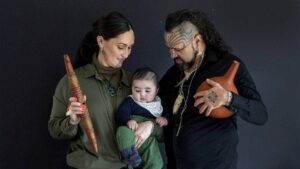 Whānau photo of artists and their child